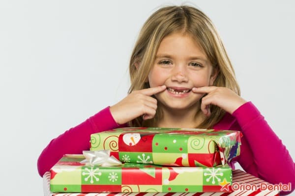 Stock image of dental care products wrapped as gifts