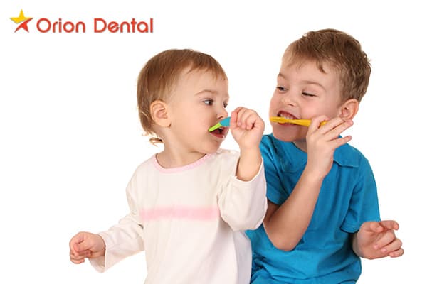 Stock image of a child brushing their teeth