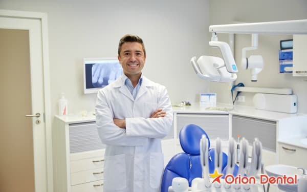 Stock image of a person talking with a dental professional