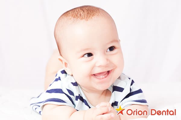 Stock image of an adult holding a baby