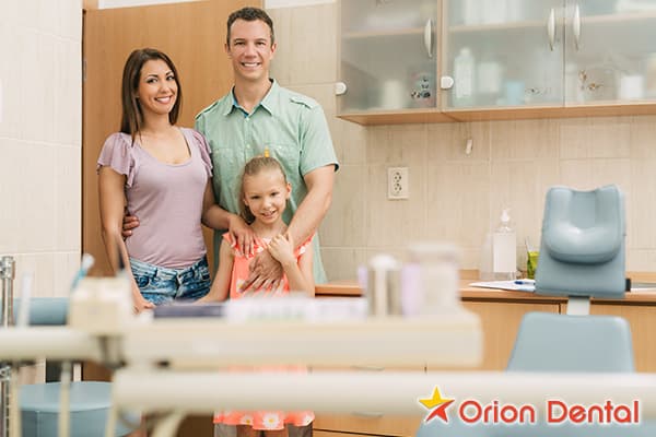 Stock image of a family smiling together