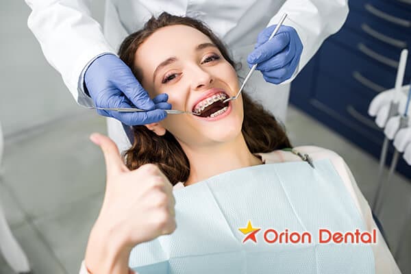 Stock image of a woman wearing braces