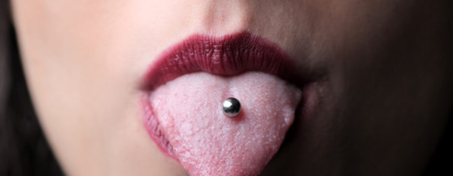 Tongue piercing impact on oral health